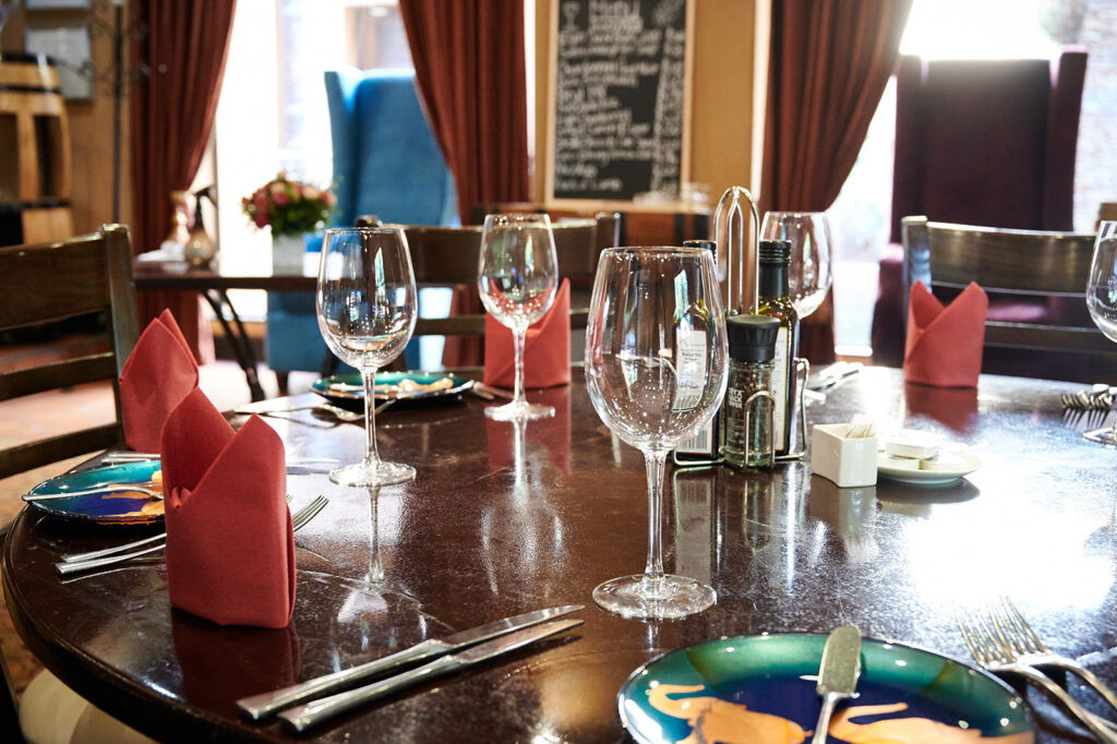 Table Setting with Wine Glasses in the Zagora Grill Room